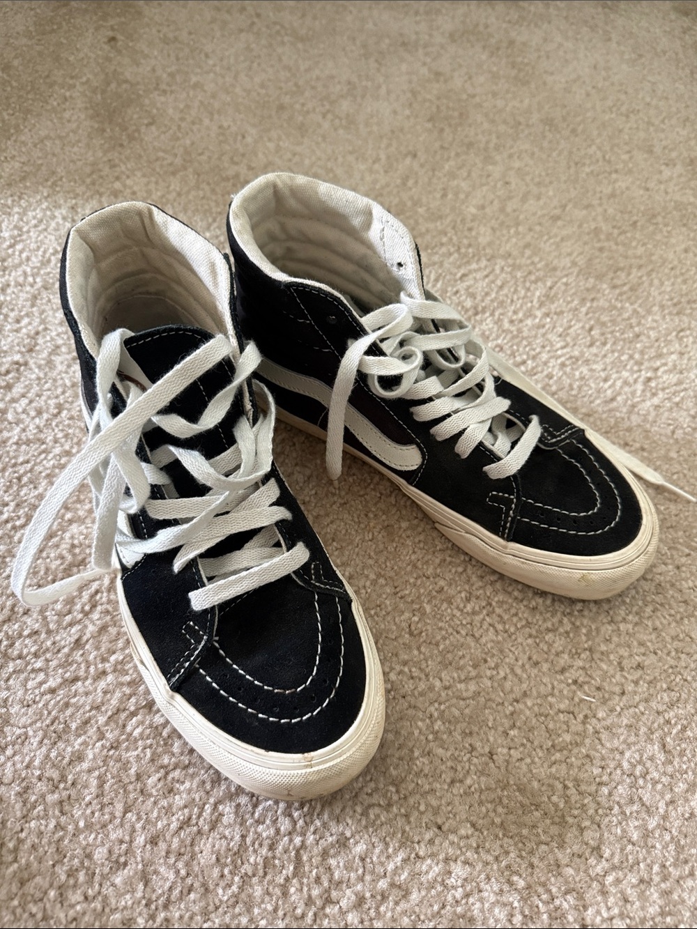 Vans Black and White High-Top Skate Sneakers